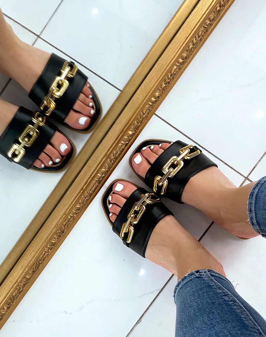 Mules noires à chaîne dorée