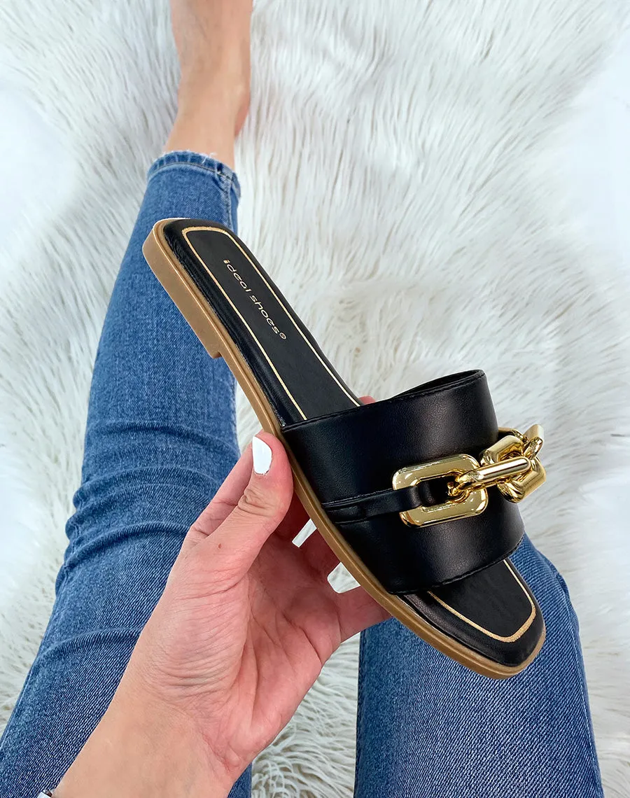 Mules noires à chaîne dorée